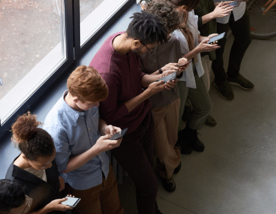 Group of people looking at phones