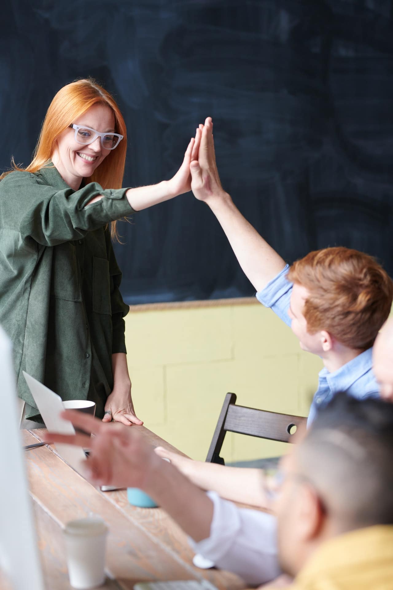 Man and woman high five